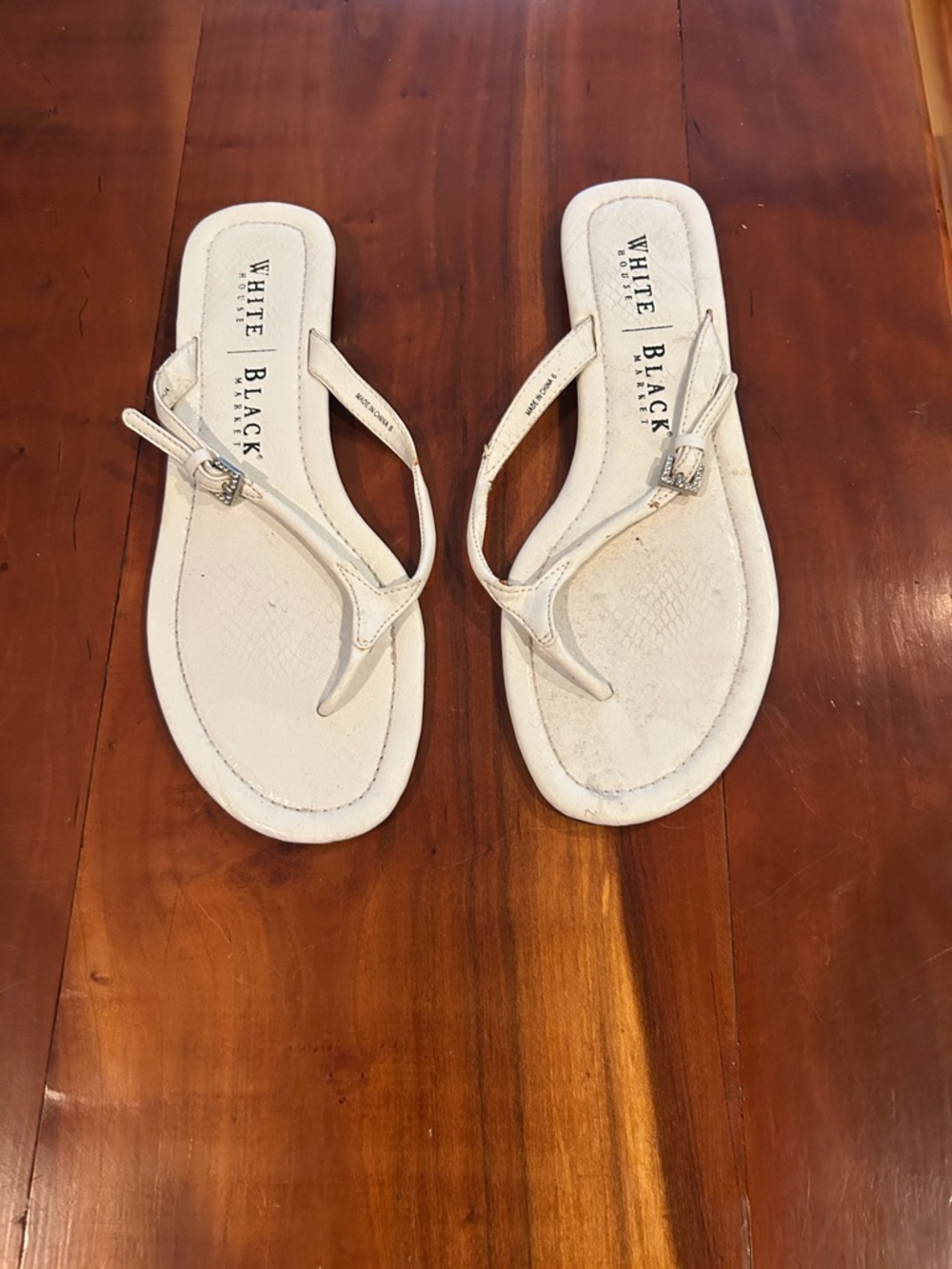 White House Black Market White Thong Sandals with Silver Buckle